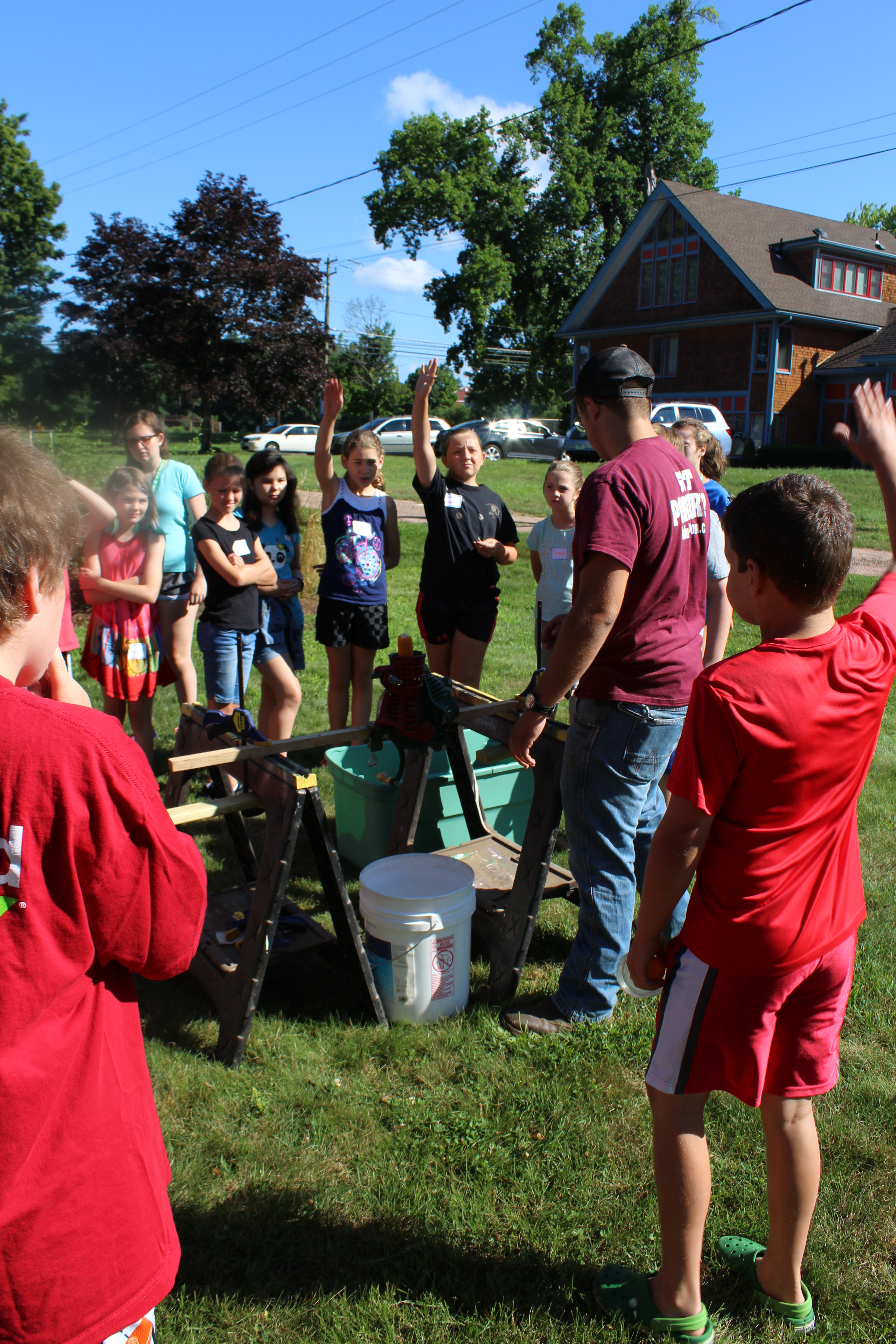 Kids raising their hands, Podunk Popcorn