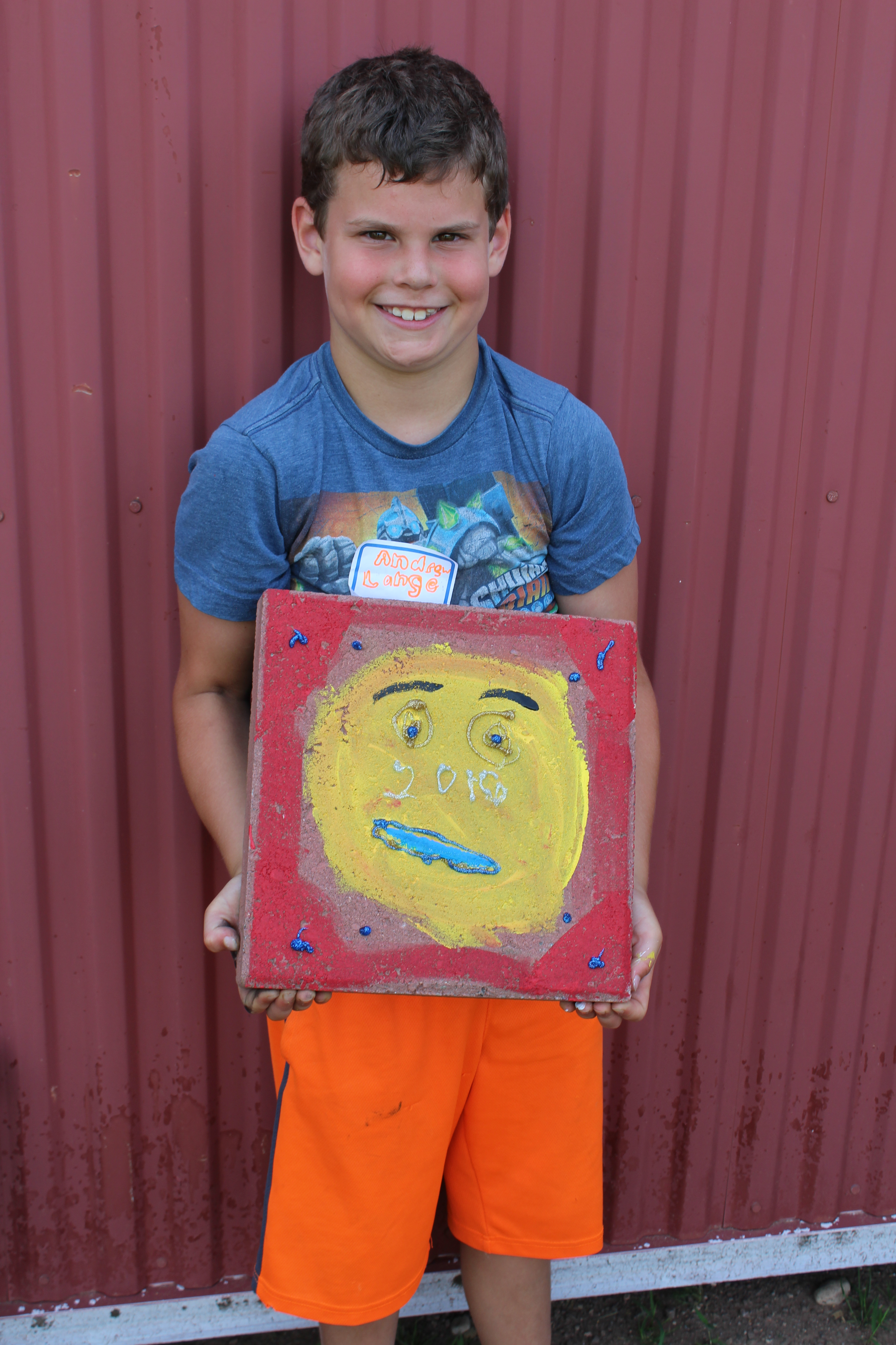 Little boy with his painting